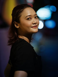 Night street portrait session with beautiful model