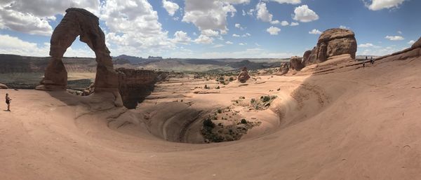 Panoramic view of desert against sky