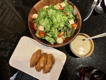 High angle view of food served on table