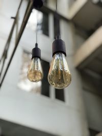 Low angle view of illuminated light bulb