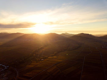 Scenic view of mountains against sky during sunset