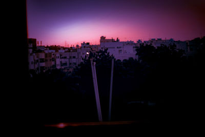 View of buildings at sunset