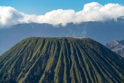 Panoramic view of volcanic landscape against sky