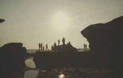 Silhouette of people on beach