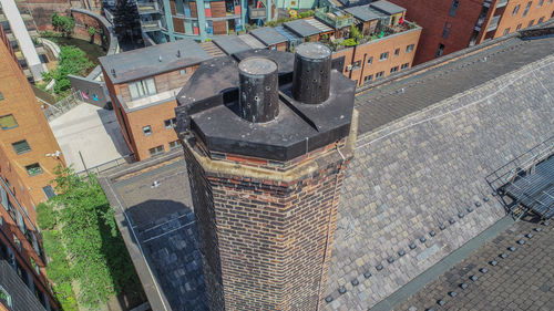 High angle view of old building by street in city