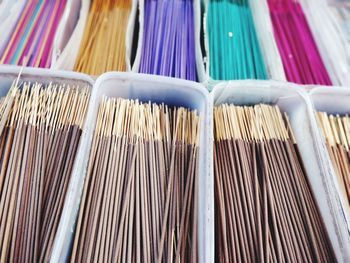 Close-up of multi colored pencils in market