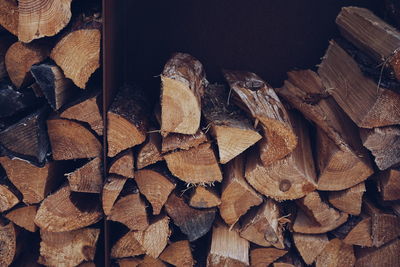 Stack of logs in shelf