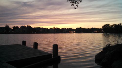 Scenic view of lake at sunset