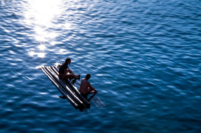 High angle view of man in boat on sea