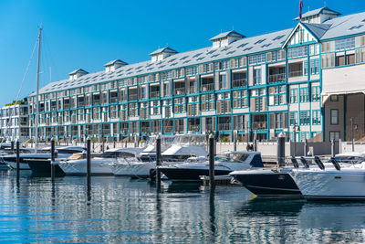Historic landmark woolloomooloo wharf with yachts and boats on sunny day