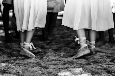 Low angle shot of bridesmaids before a beach wedding 