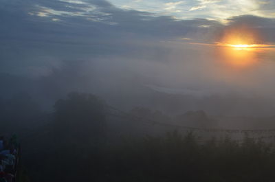 Scenic view of mountains against sky during sunset