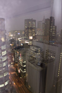 Illuminated cityscape at night