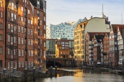 Nikolaifleet canal near elbphilharmonie building in hamburg, germany