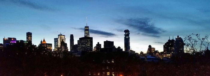 Low angle view of skyscrapers against sky