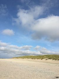 Scenic view of land against sky