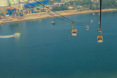 High angle view of sailboat sailing on sea against sky