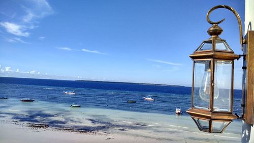 Scenic view of sea against blue sky