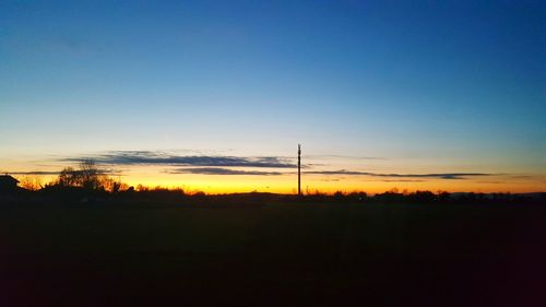 Scenic view of silhouette trees against sky during sunset