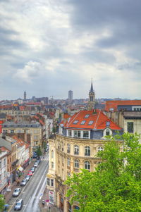 High angle view of buildings in city against sky