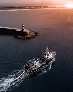 High angle view of lighthouse at seaside