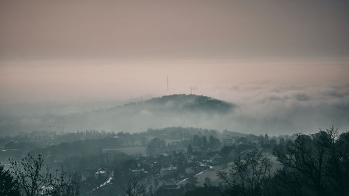 Scenic view of mountains against sky during winter