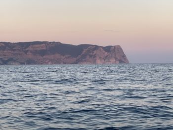 Scenic view of sea against sky during sunset