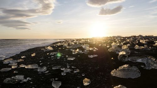 Scenic view of sea against sky at sunset