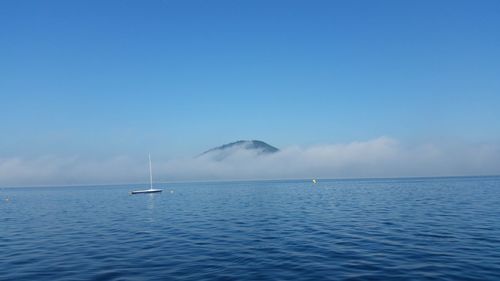 Boat sailing in sea