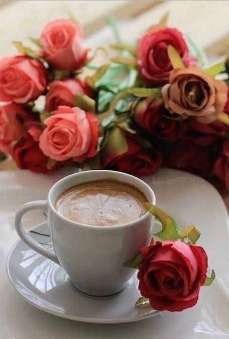 CLOSE-UP OF ROSE BOUQUET WITH ROSES IN CUP