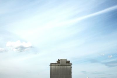 Low angle view of built structure against blue sky