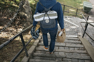 Man walking down steps