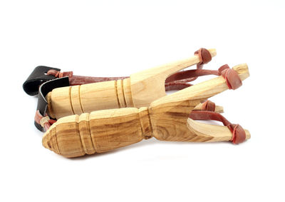 High angle view of shoes on wood against white background