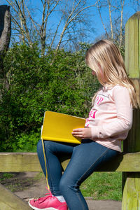 Woman sitting in park