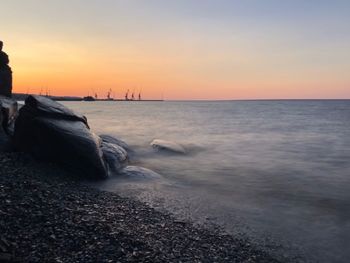 Scenic view of sea against sky during sunset