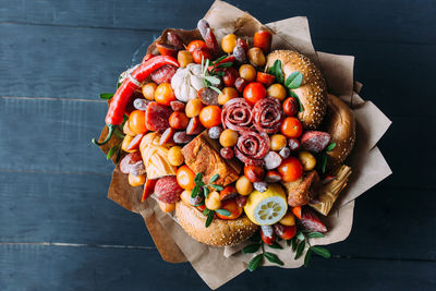 Delicious edible bouquet of sausage, tomatoes, cheese. gift for man.