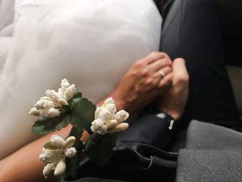 Close-up of hand holding bouquet