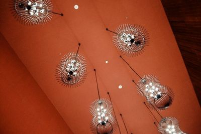 Low angle view of illuminated chandelier