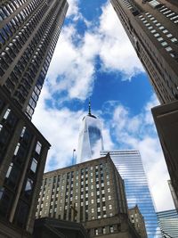 Low angle view of modern buildings against sky