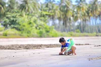 Full length of boy at beach