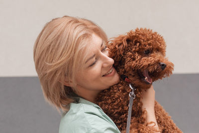 Portrait of woman with dog