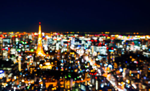 High angle view of illuminated buildings at night