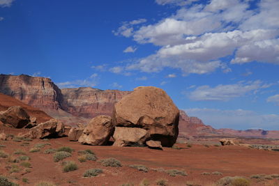 Rock formations in desert against sky