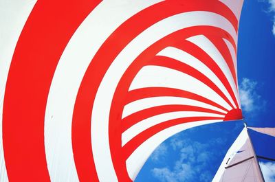 Low angle view of white balloons