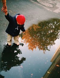 Close-up of woman standing in pond