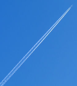 Low angle view of vapor trail in sky