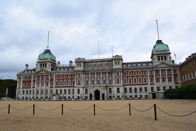 Building against cloudy sky