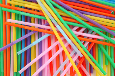 Full frame of colorful drinking straws