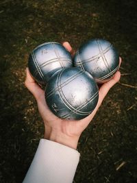 Close-up of hand holding ball