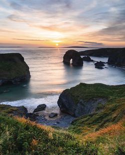 Scenic view of sea against sky during sunset